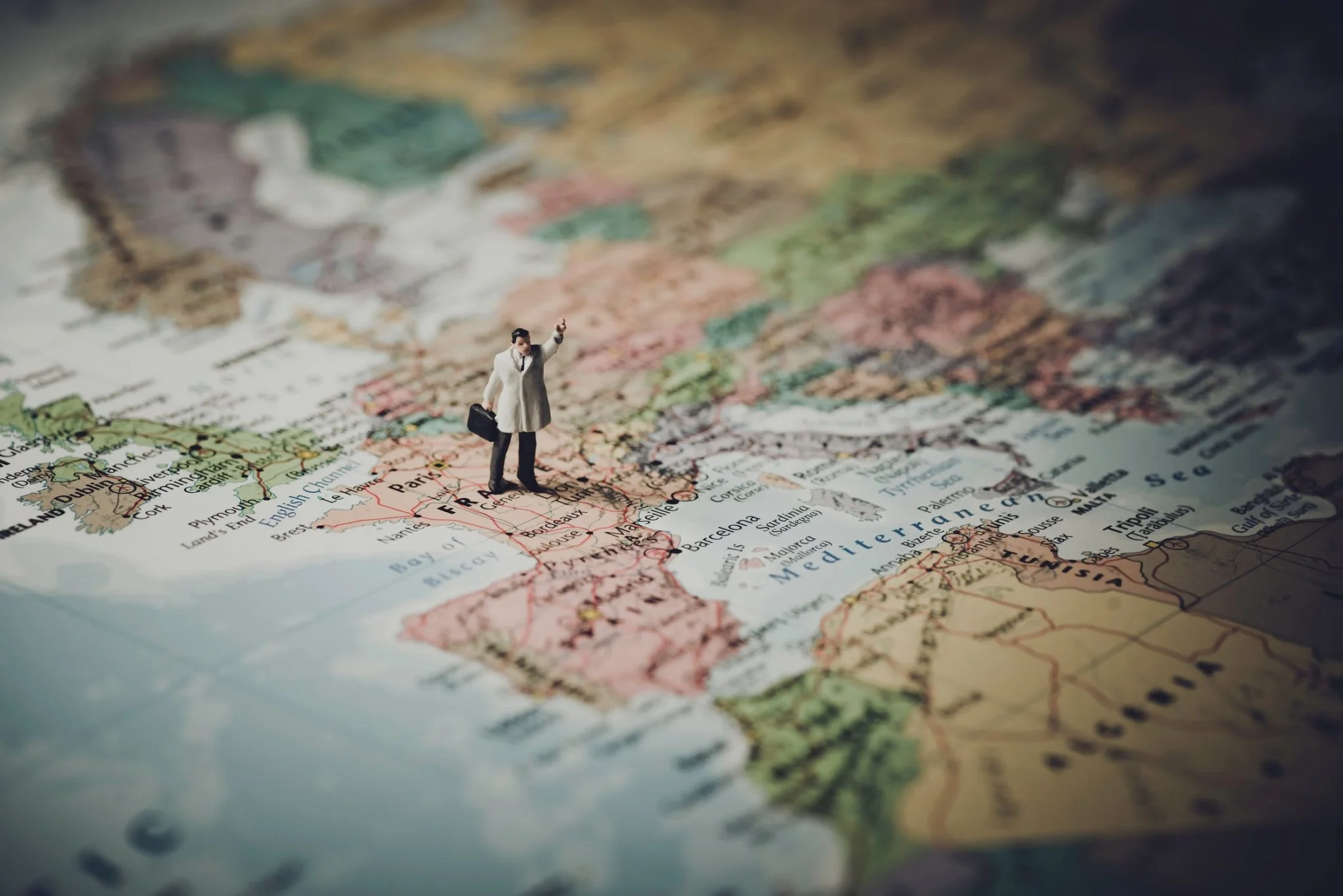 Miniature Man on Map