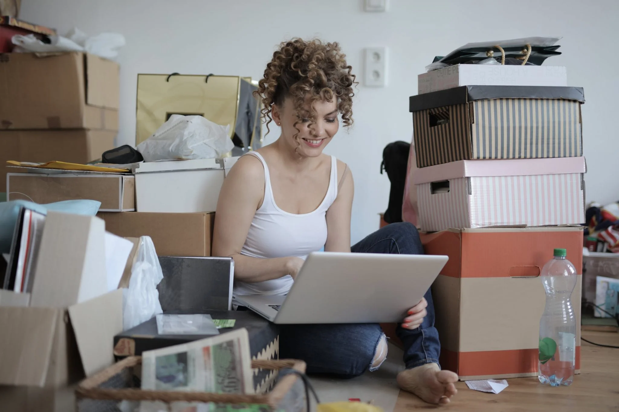 Woman Working in Messy Room
