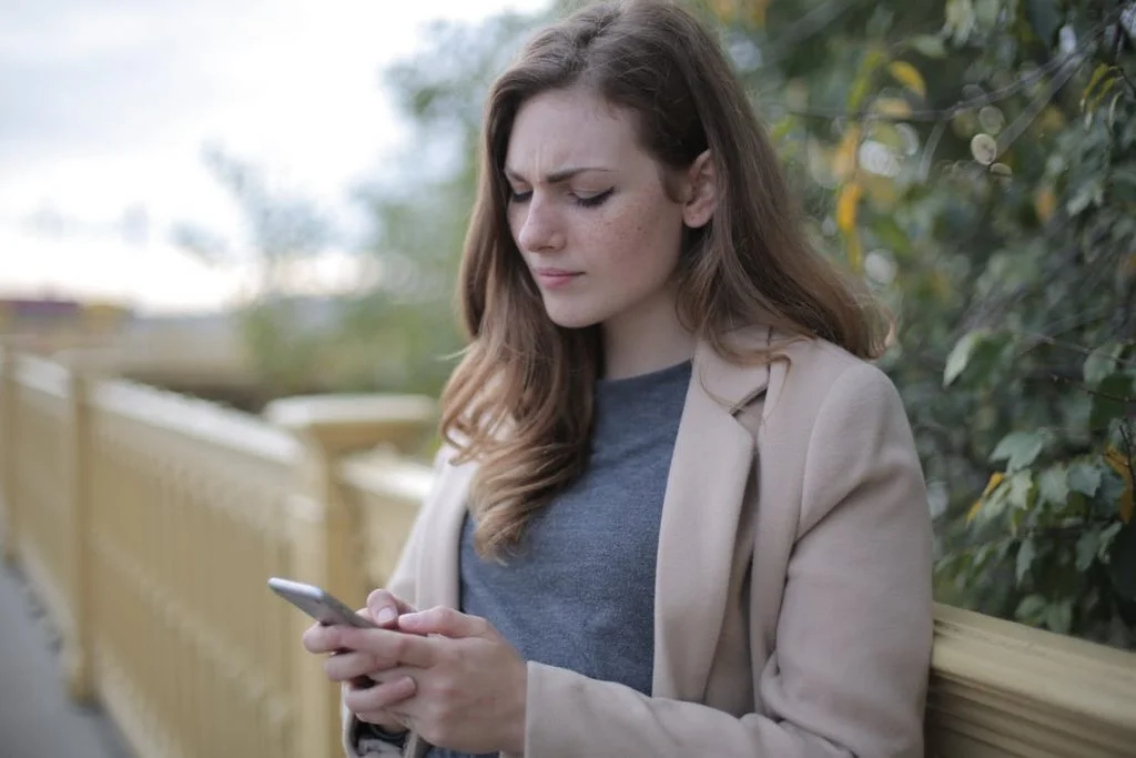 Woman Holding Phone