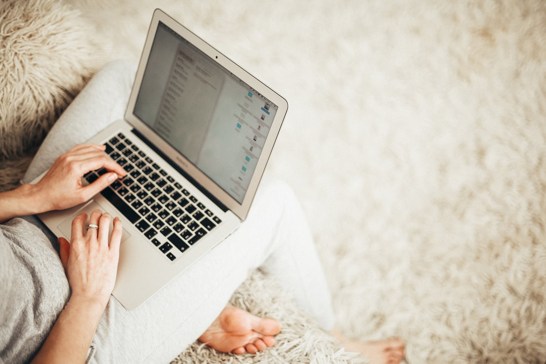 Woman Working On White Laptop